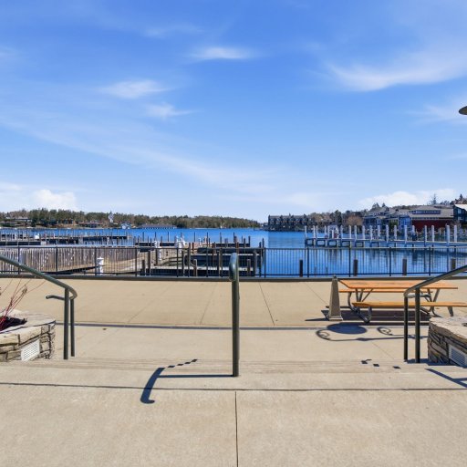 Charlevoix waterfront promenade — a one-minute walk from the loft, leading to the bridge, marina, and East Park beach.