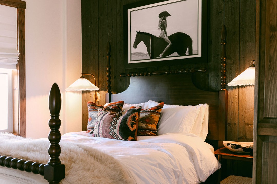 Downstairs queen bedroom with western touches at Wild Moon Ranch