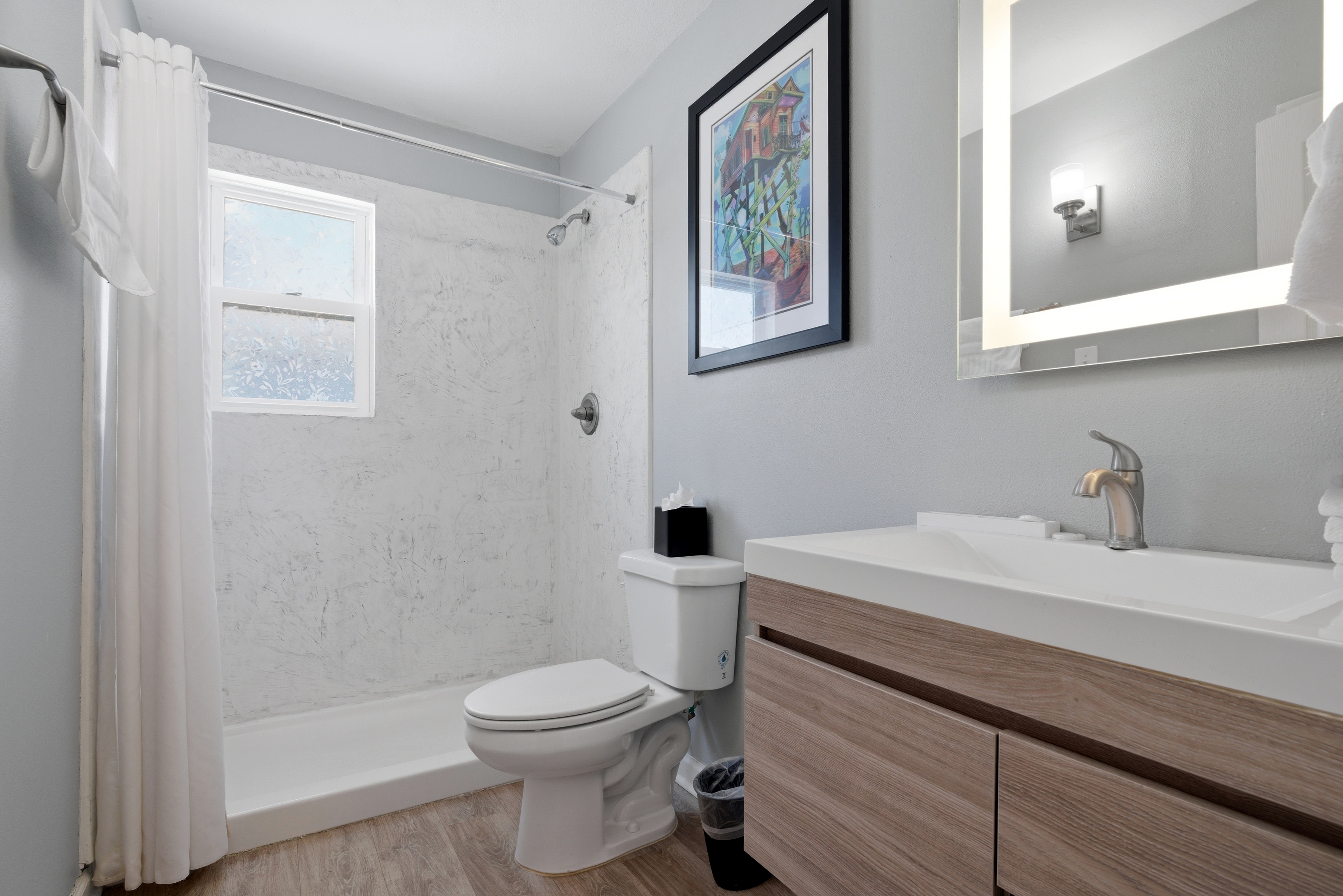 Unit 307-Bright bathroom with essentials to refresh & unwind. Perfect space to get ready with ease