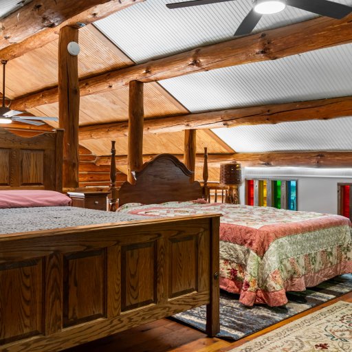 Loft queens under the log beams