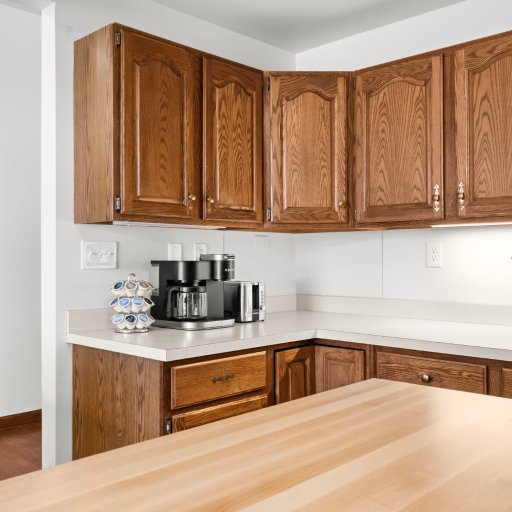 Coffee station stocked every morning — drip maker, mugs, and prep space for the whole crew.