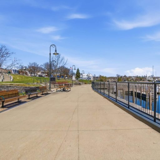 Charlevoix harbor boardwalk — benches and lake views, a short walk from Bridge Street.