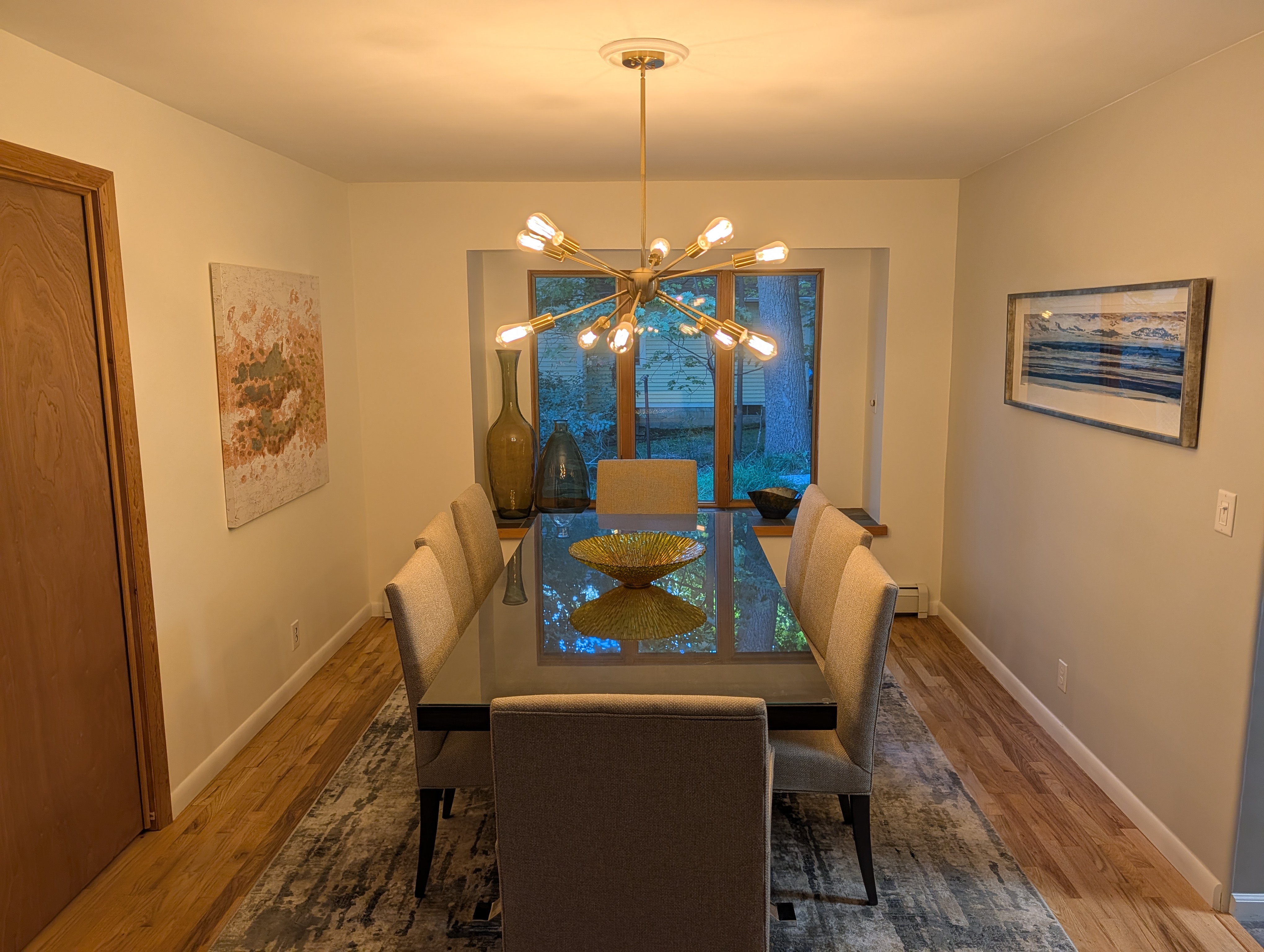 DINING AREA (SECOND FLOOR):  Features both a formal dining table with seating for 8 adults and a breakfast or card table with seating for 4 adults.