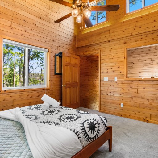 Second bedroom with forest views