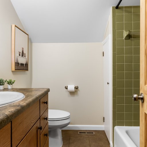 Upstairs bathroom vanity, with the tub alongside