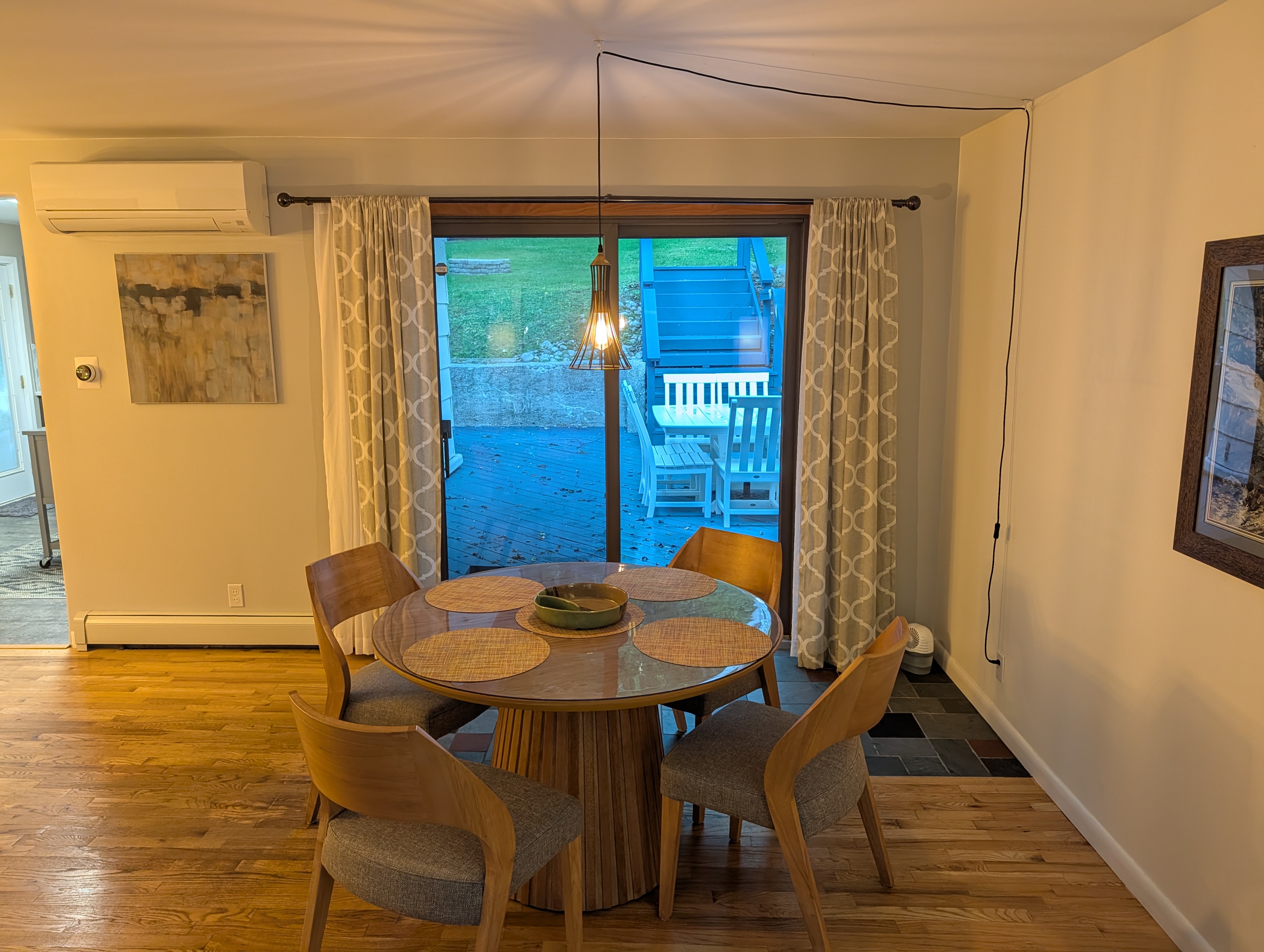 DINING AREA (SECOND FLOOR):  Features both a formal dining table with seating for 8 adults and a breakfast or card table with seating for 4 adults.
