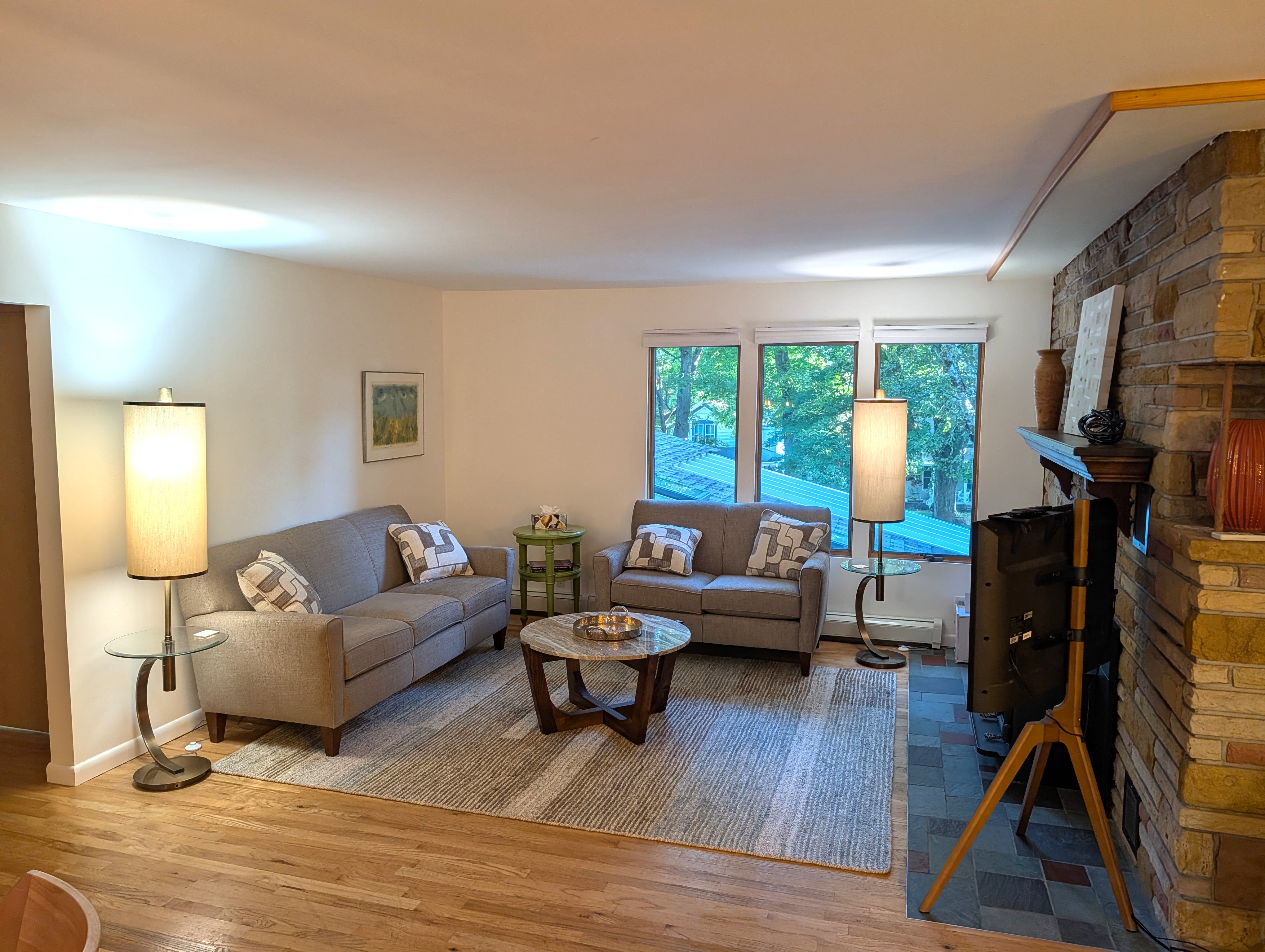 LIVING ROOM #2 (SECOND FLOOR):  Features a sofa, loveseat, coffee table, and television.  (Note that the wood fireplace is not available for guest usage.)