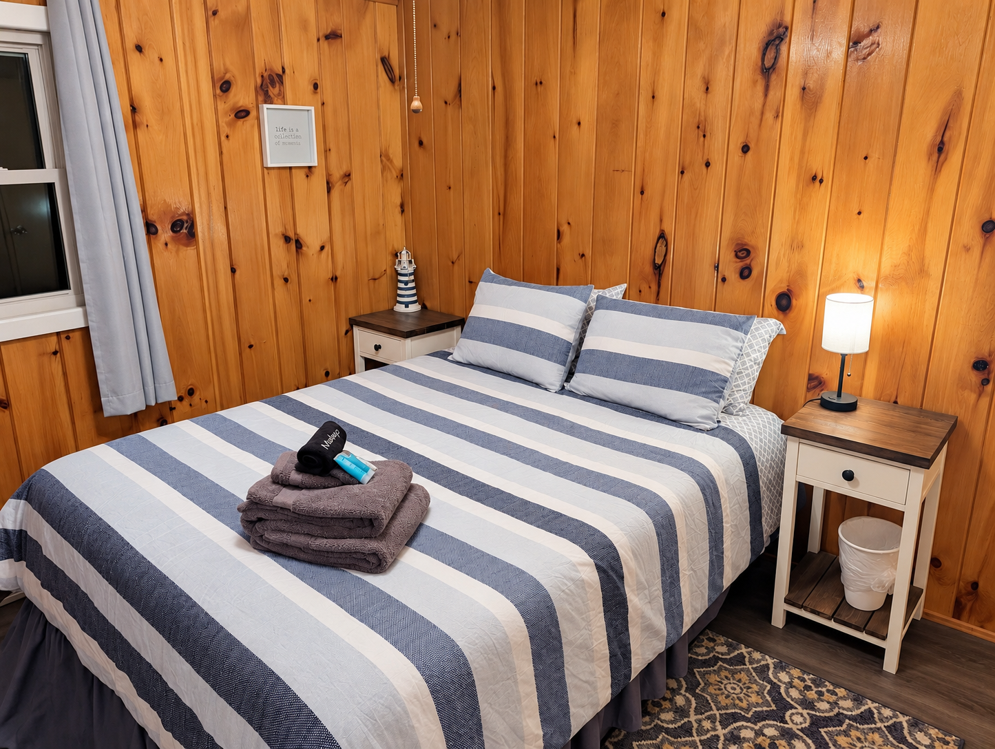 BEDROOM #2:   Features a queen-size bed, nightstands, lamp, dresser, closet, and chair.