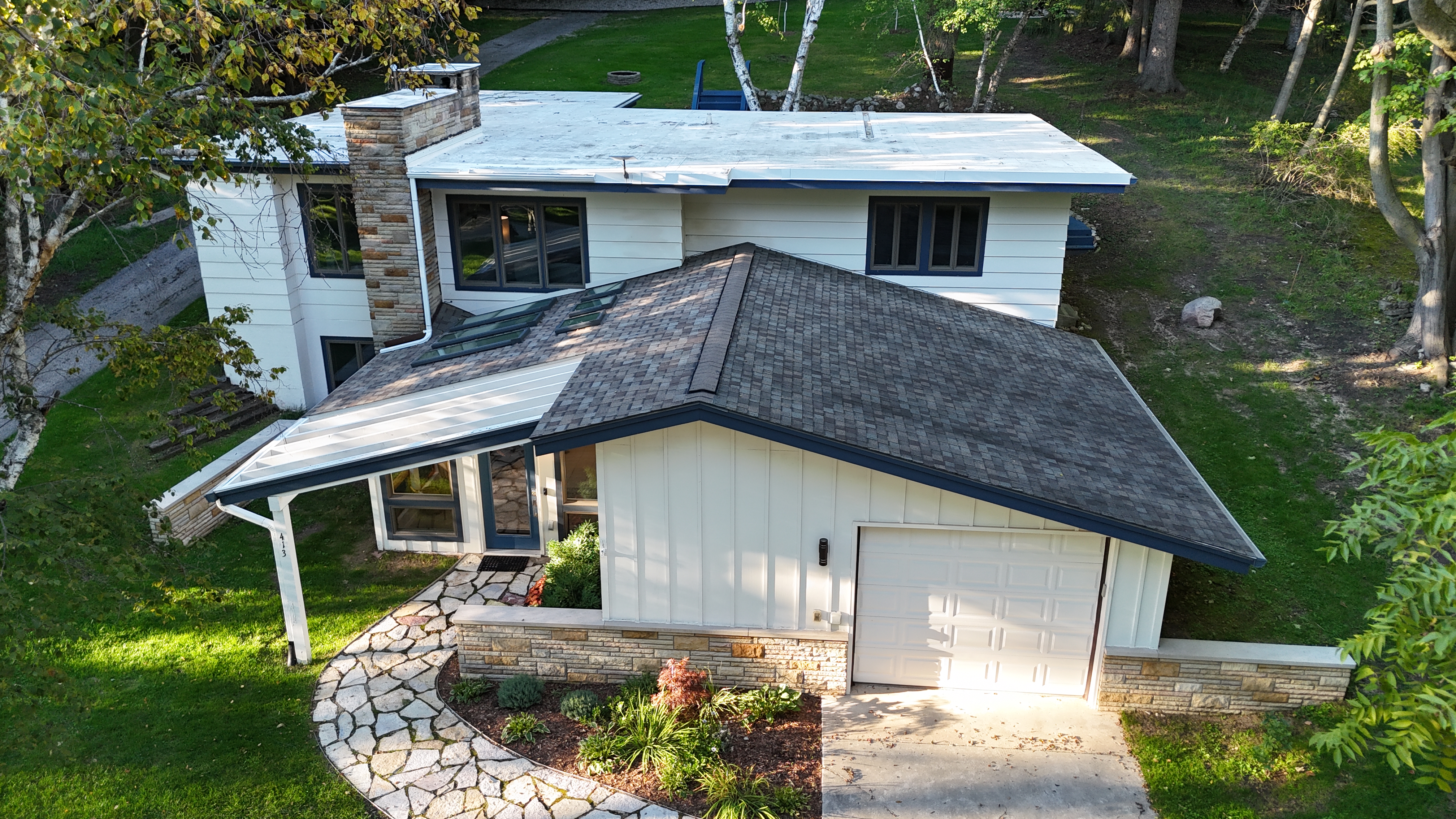 EXTERIOR:   Another aerial photo of the property.