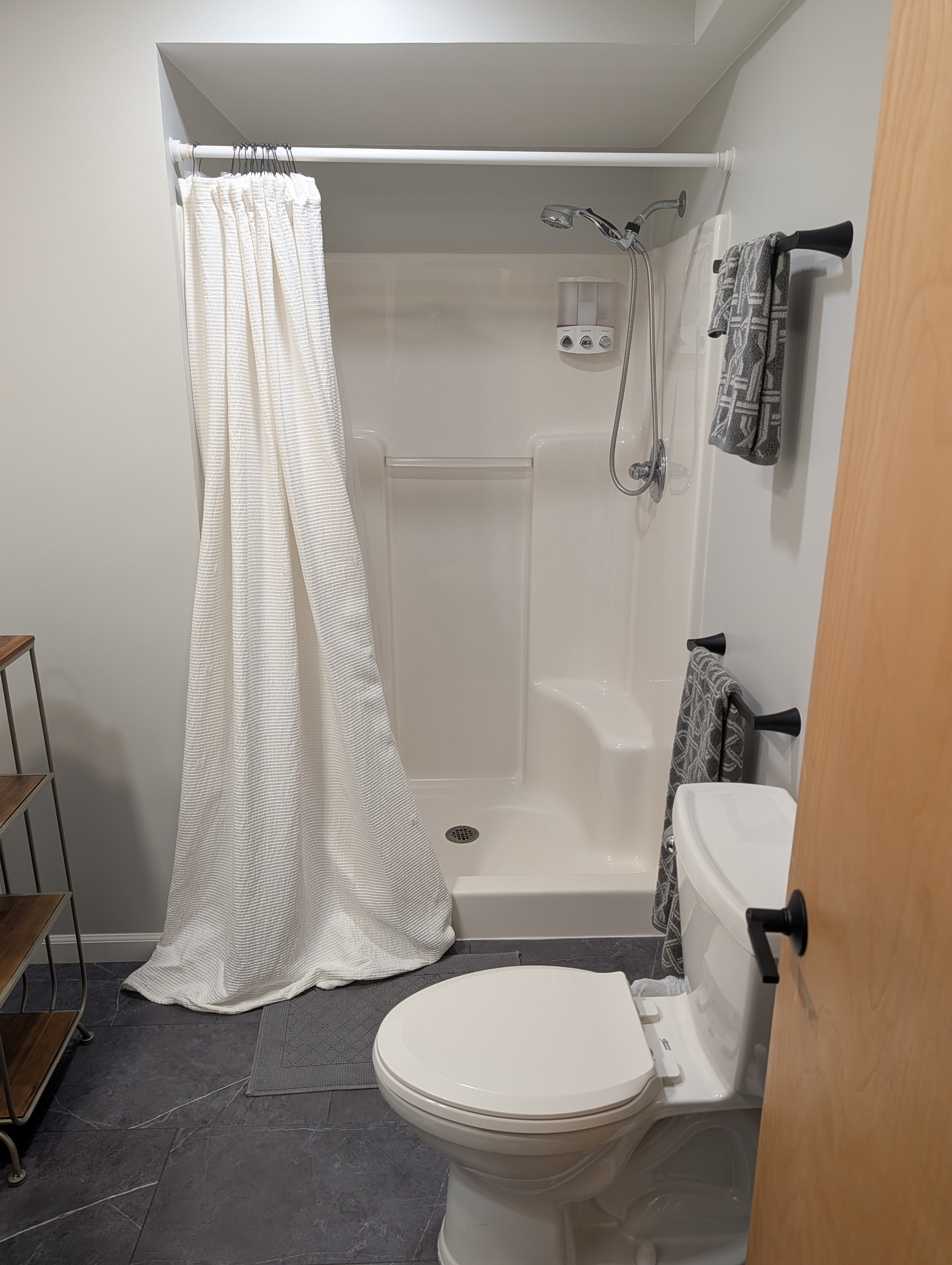 BATHROOM #1 (FIRST FLOOR):  Full bathroom on the first floor with a walk-in shower.