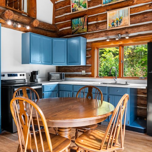 Full kitchen with range, refrigerator, coffee maker and microwave
