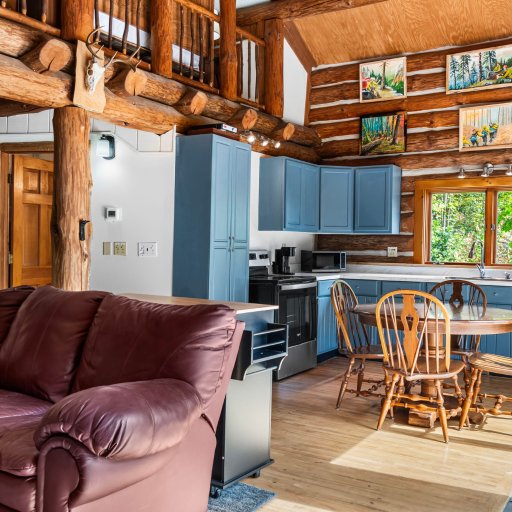 Living room flowing into the kitchen and dining area