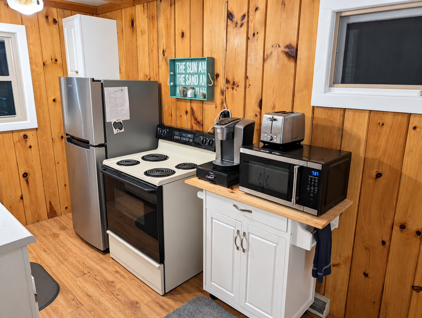 KITCHEN:  The home has a very convenient galley kitchen with all appliances except for a dishwasher.