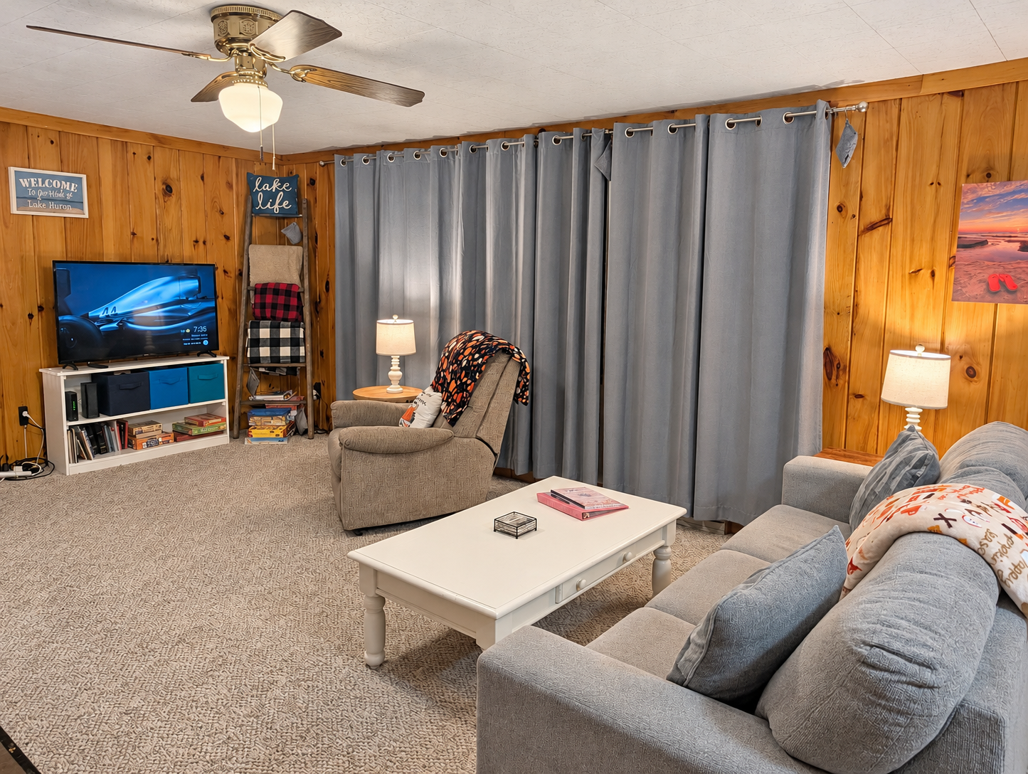 OVERVIEW:  The home has a comfy and relaxing living room with a sofa, chair coffee table, and television.  (Note that the wood fireplace in the living room is not available for guest usage.)
