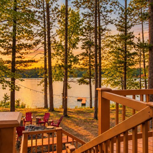 Steps from the upper deck down to the fire pit and the water