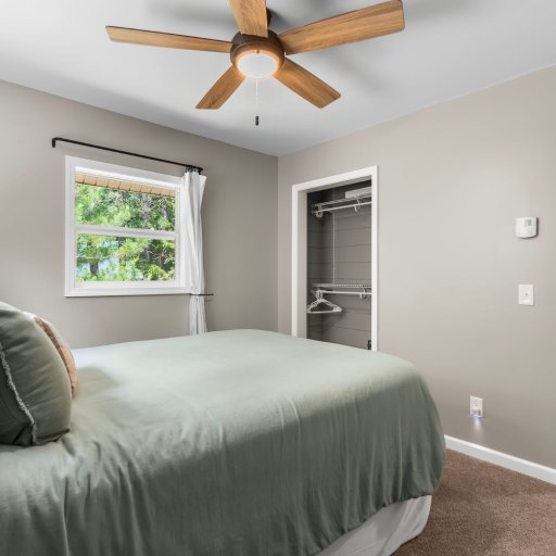 Queen bedroom with closet storage