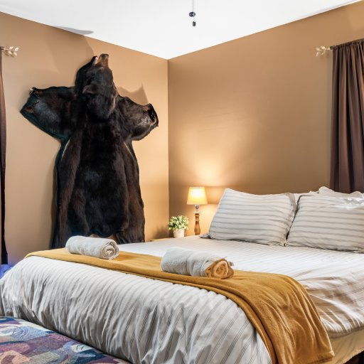 The bear room - main-floor queen, and the bear the house is named for