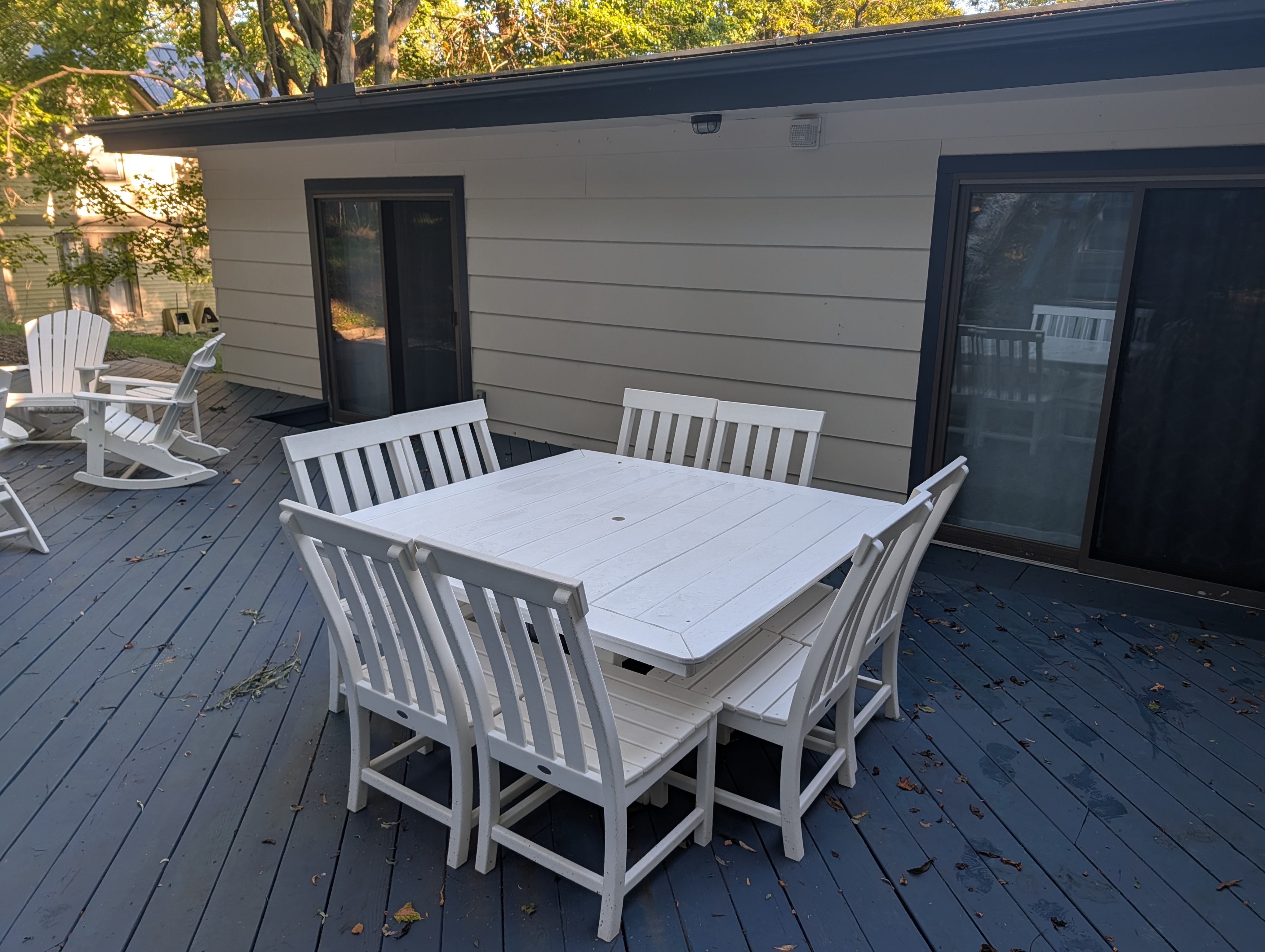 EXTERIOR:  The outdoor dining table on the backyard deck.