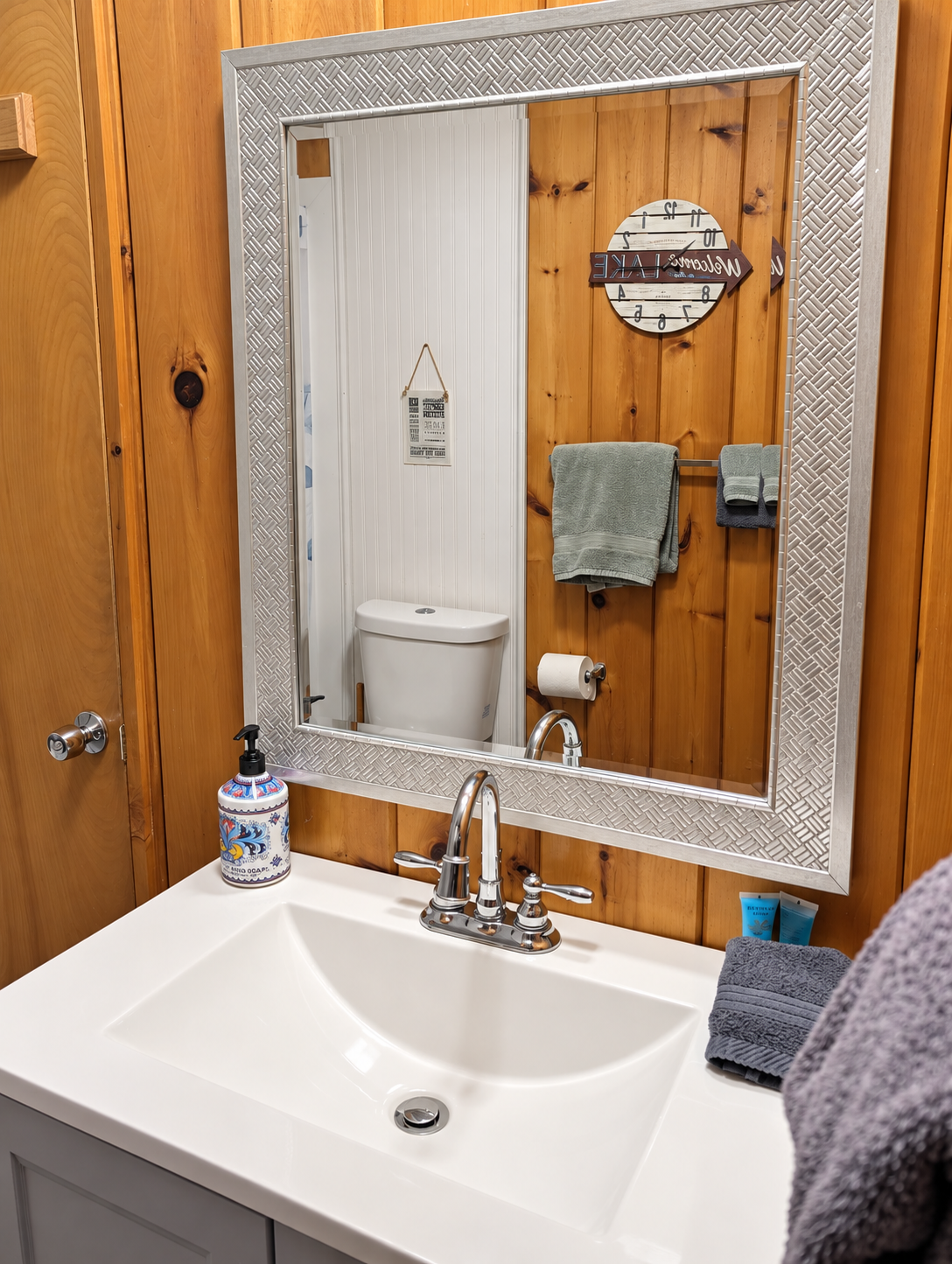 BATHROOM:  The home has a full-size bathroom with a walk-in shower.