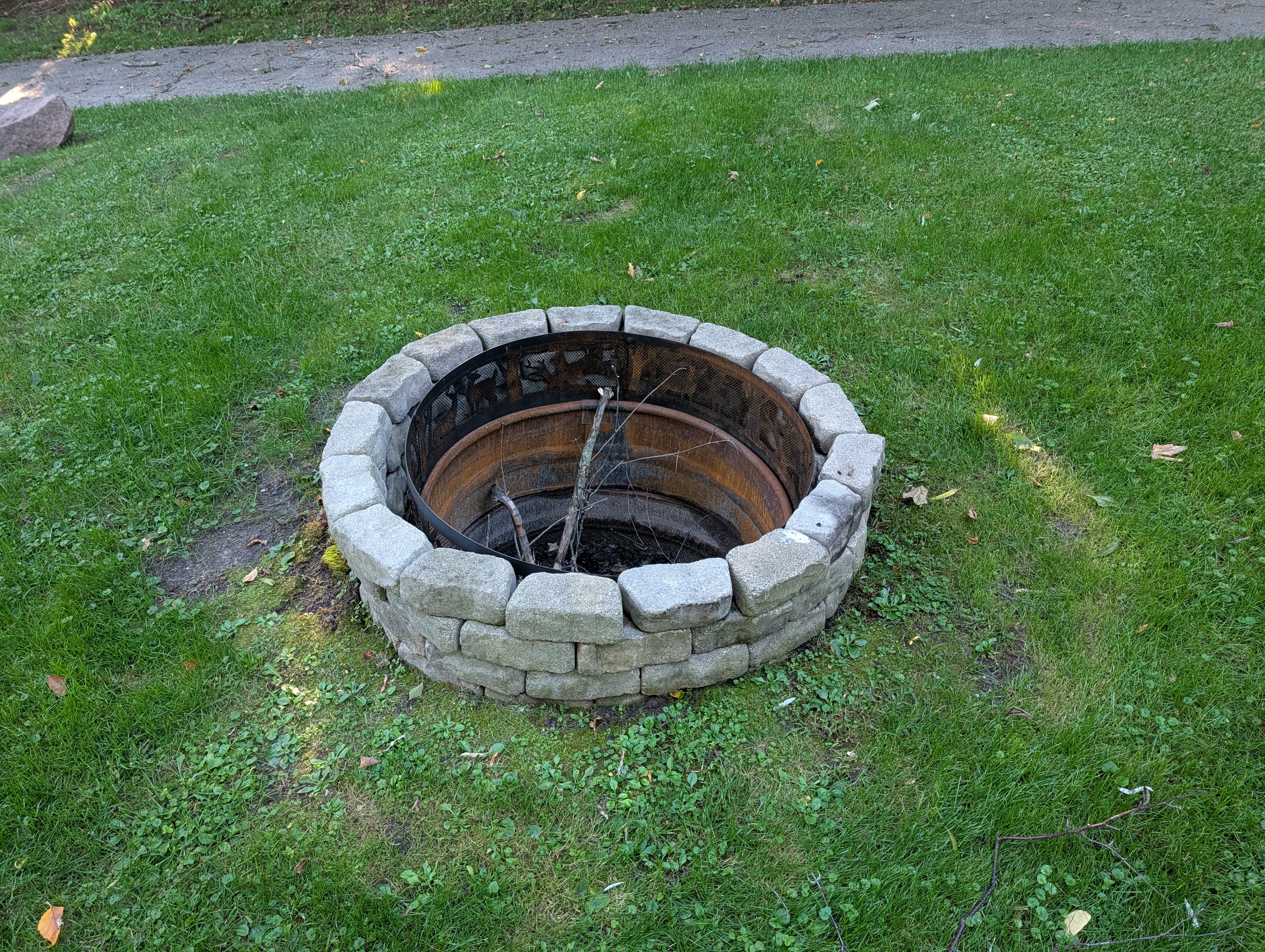 EXTERIOR:  The backyard bonfire ring