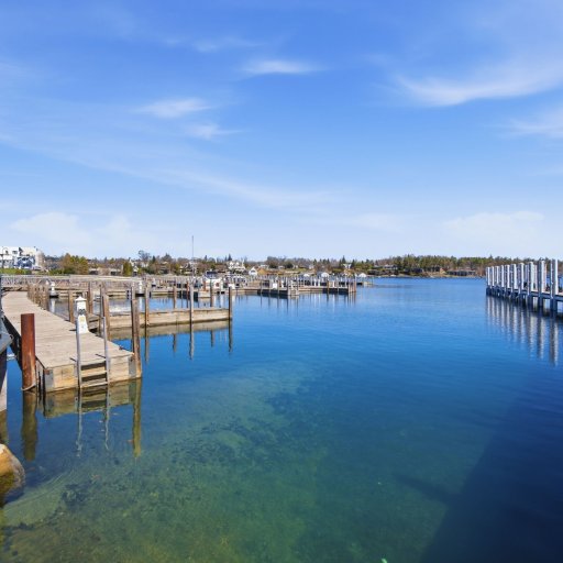 The Charlevoix city marina sits a one-minute walk from the loft, with Lake Michigan through the drawbridge.