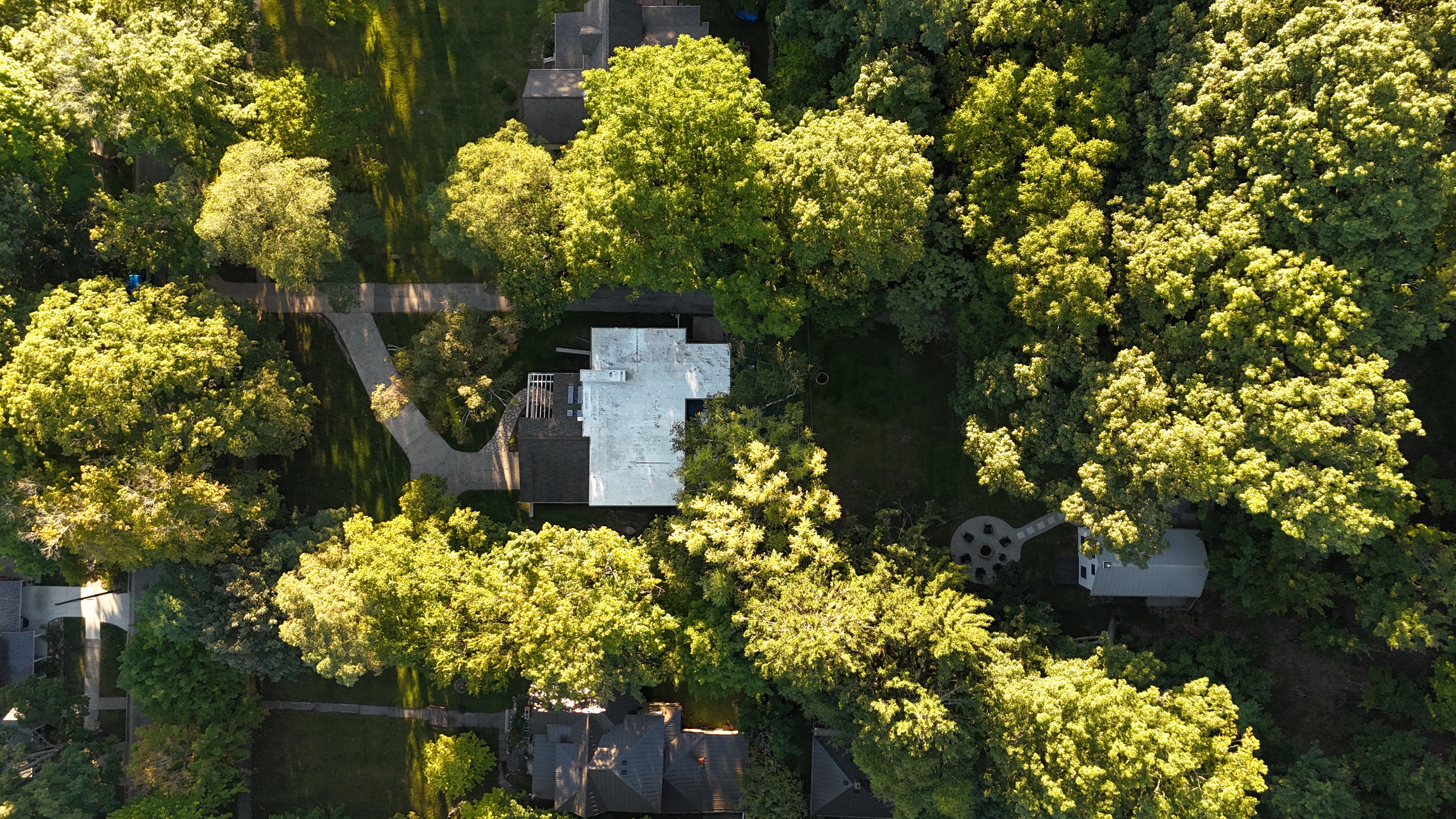 EXTERIOR:  Aerial photo of the house.  (Deer Run, a separate vacation rental property, shares the same driveway and is shown at the right of the photo.)