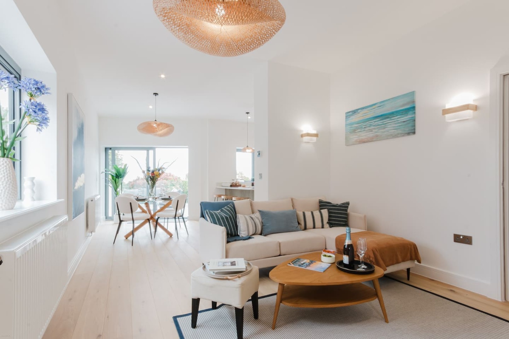 Open-plan lounge and dining space, styled for relaxed evenings at home.