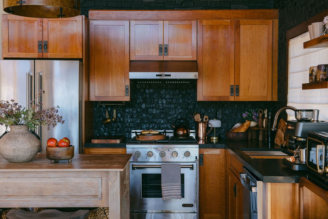Chef's kitchen with a full-size range for private chef dinners at Wild Moon Ranch