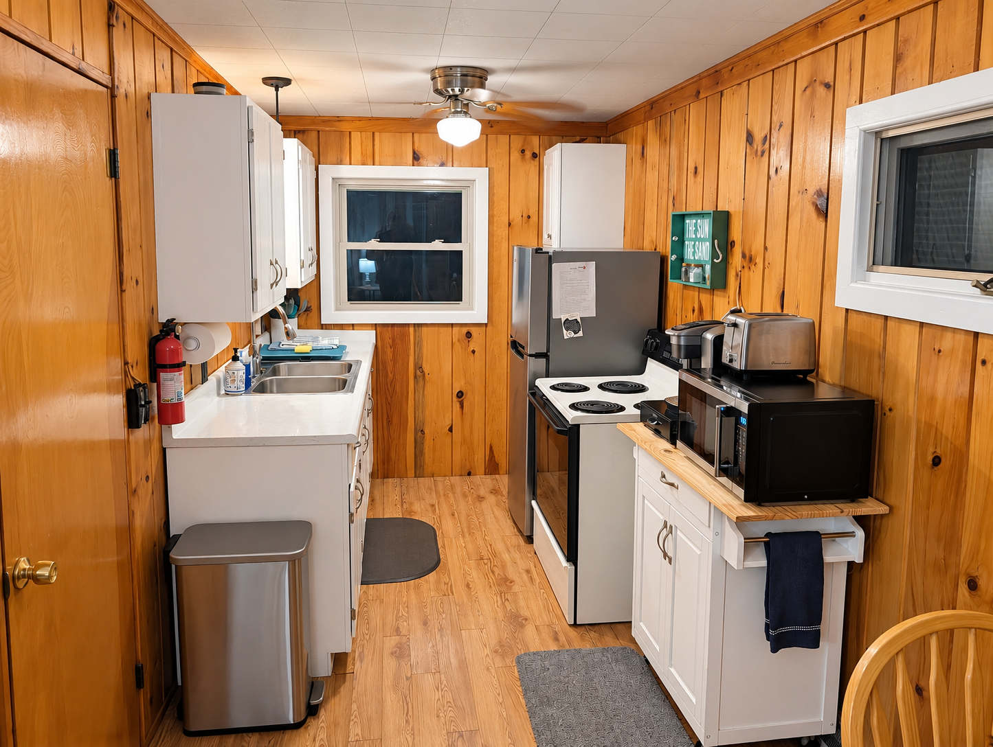 KITCHEN:  The home has a very convenient galley kitchen with all appliances except for a dishwasher.