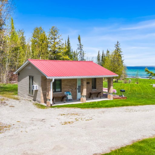Welcome to Little Lems — your cozy cabin with beach access, firepit, and space to relax on 5 shared lakefront acres