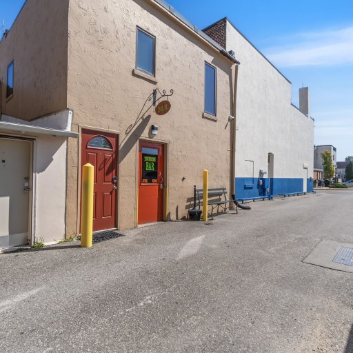 Dedicated parking beside the private entrance, off the alley behind Bridge Street.