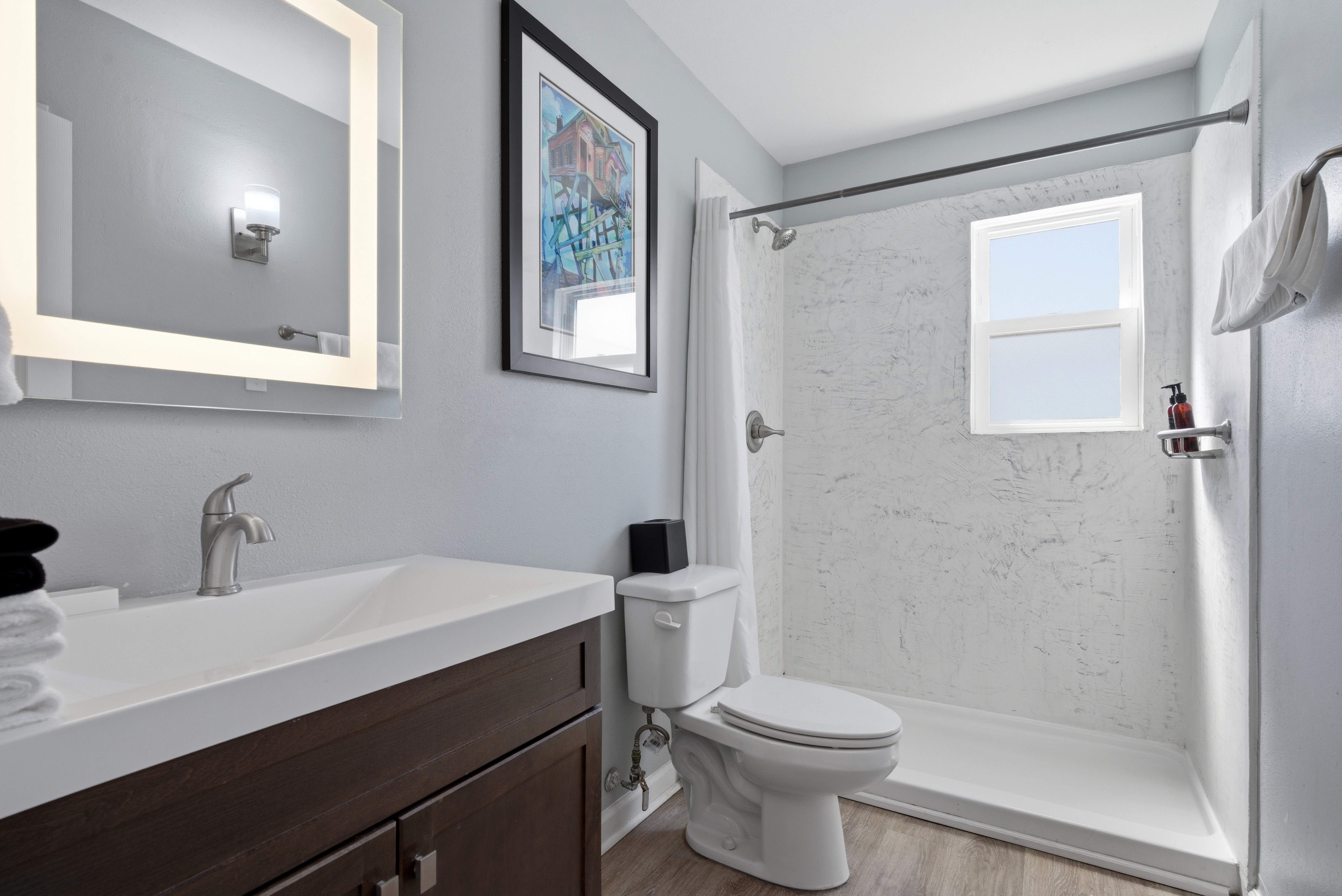 Unit 301-Fresh bathroom space stocked with essentials to refresh & unwind