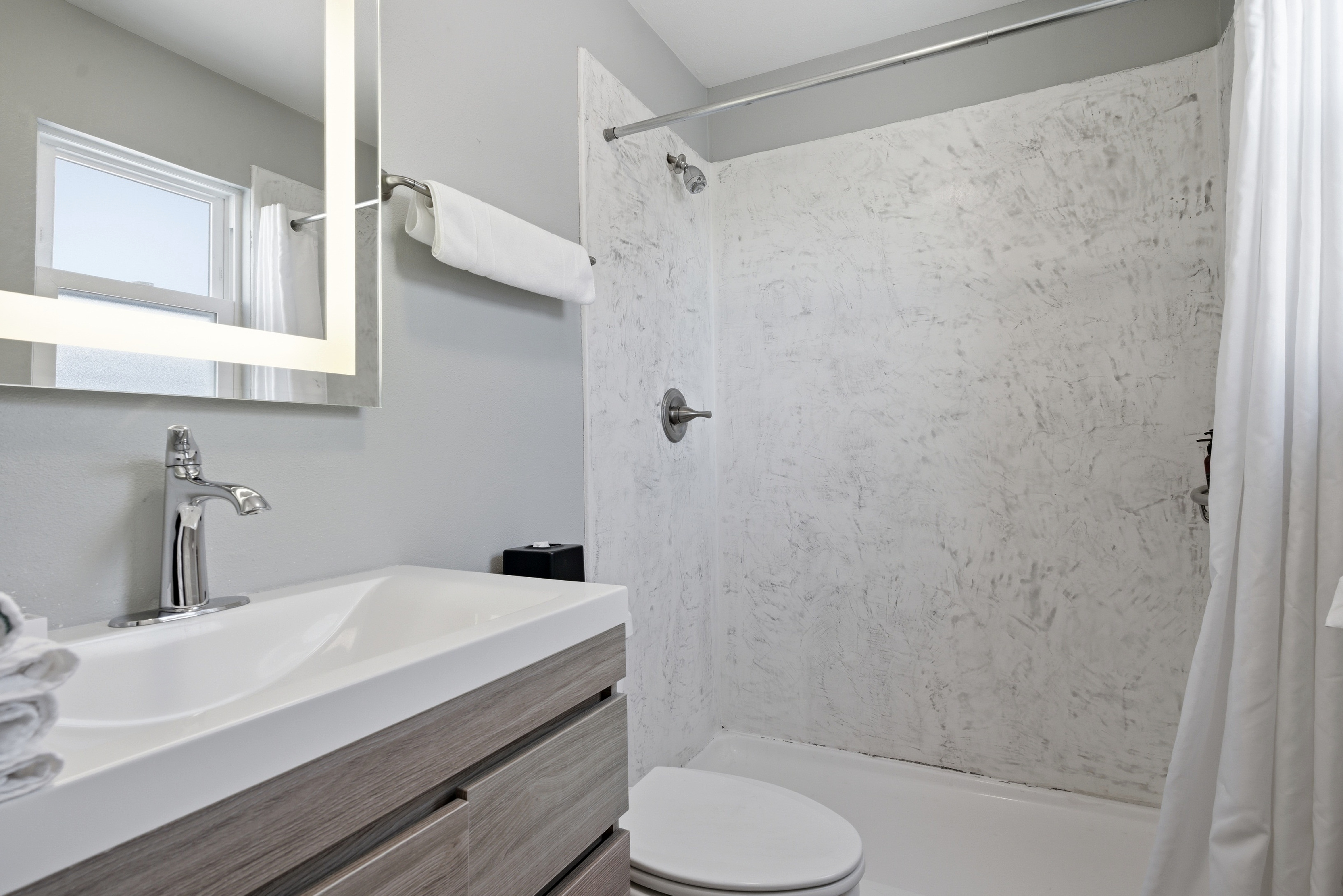 Unit 306-Fresh bathroom space stocked with essentials to refresh & unwind
