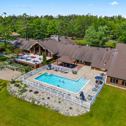 The Michaywe clubhouse and outdoor pool - guest access included with your stay