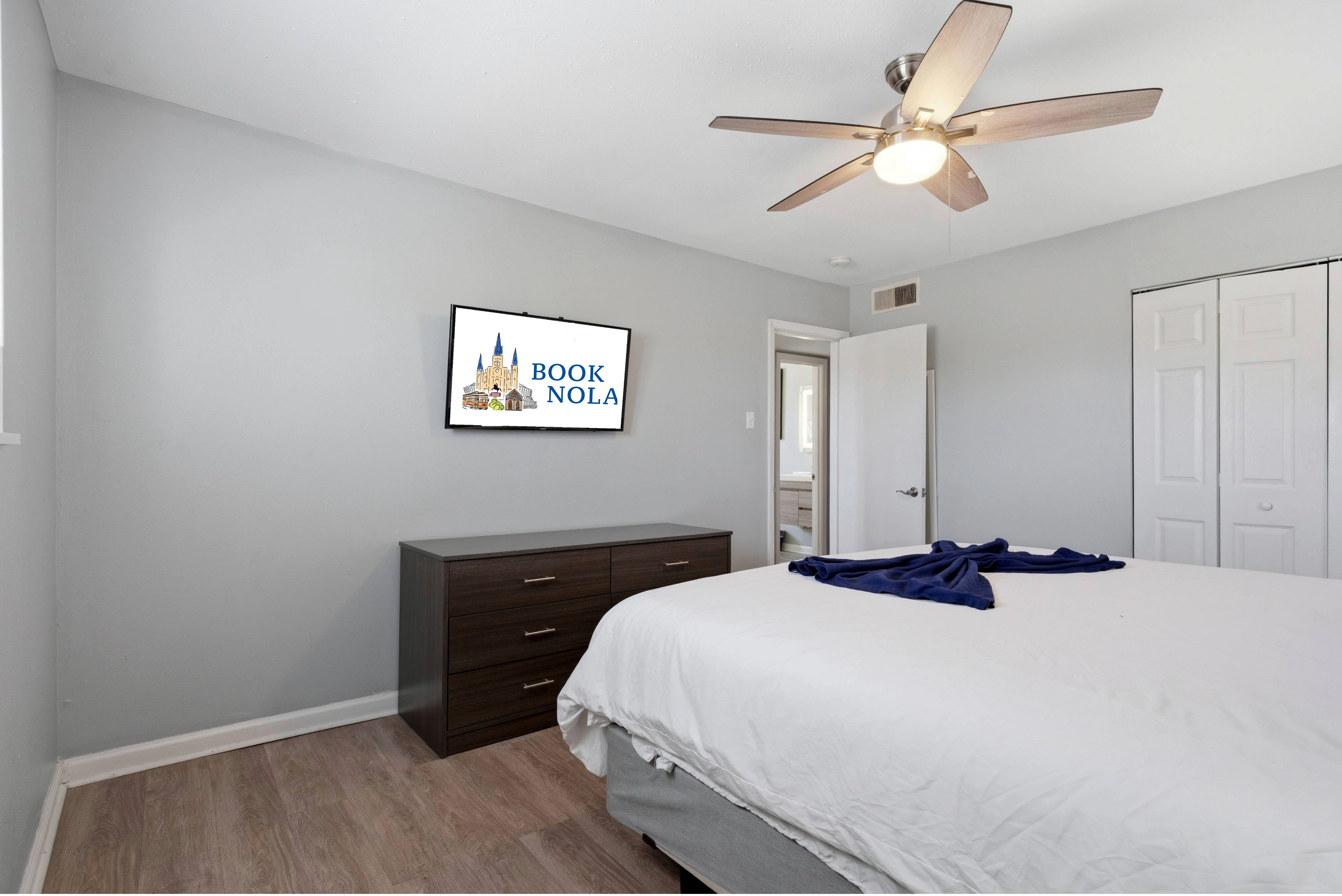 Cozy king bedroom with smart TV