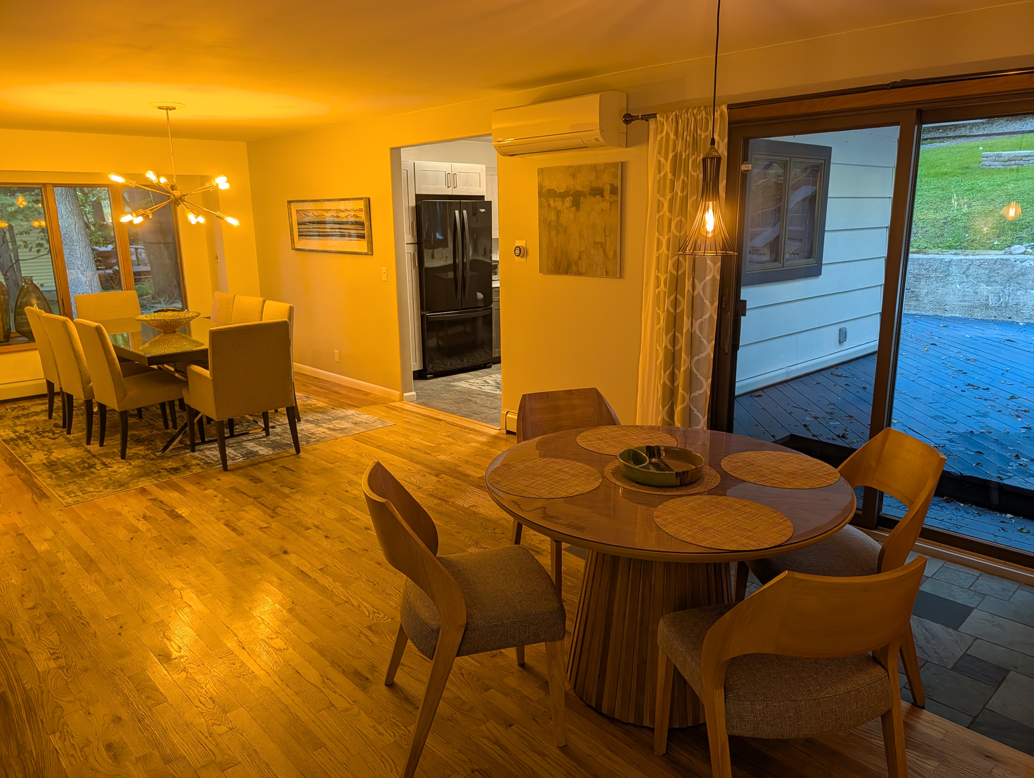 DINING AREA (SECOND FLOOR):  Features both a formal dining table with seating for 8 adults and a breakfast or card table with seating for 4 adults.