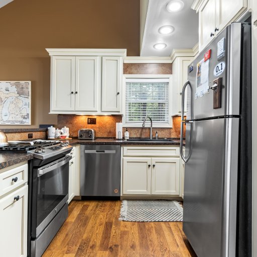 Gas range, full-size fridge and dishwasher
